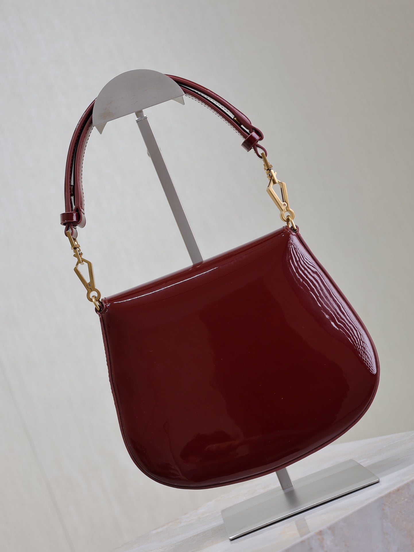 Luxury Saint Laurent VOLTAIRE SADDLE BAG 21 IN BORDEAUX RED PATENT CALFSKIN