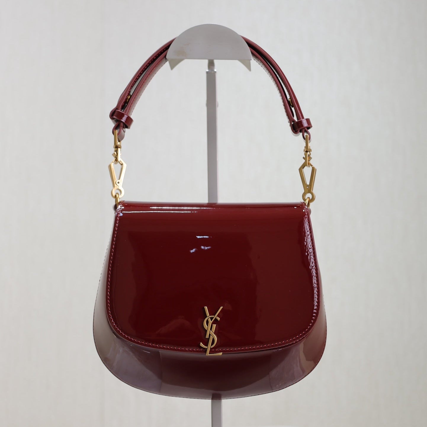 Luxury Saint Laurent VOLTAIRE SADDLE BAG 21 IN BORDEAUX RED PATENT CALFSKIN