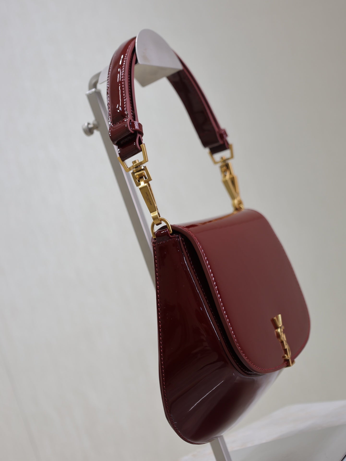Luxury Saint Laurent VOLTAIRE SADDLE BAG 21 IN BORDEAUX RED PATENT CALFSKIN