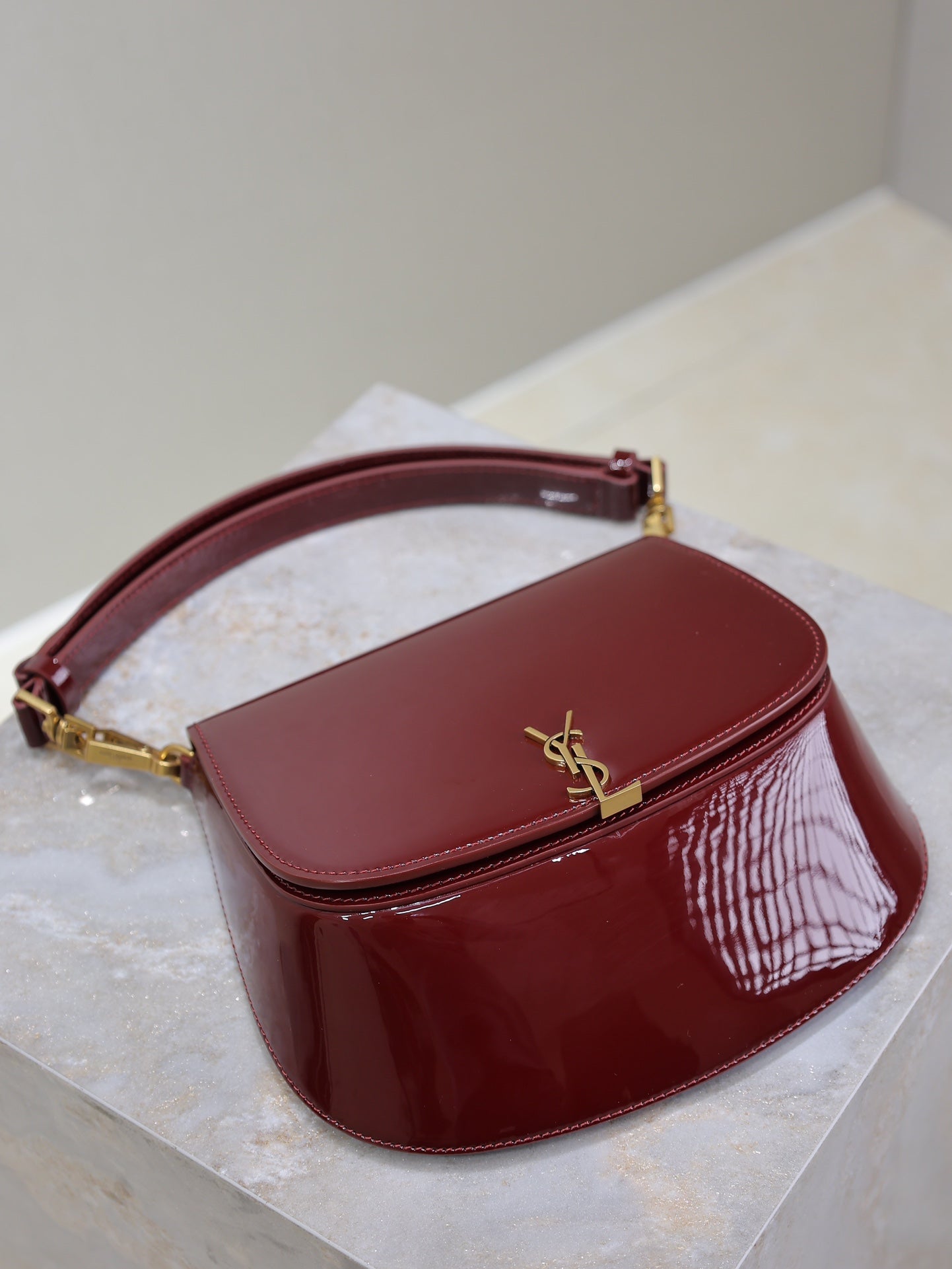 Luxury Saint Laurent VOLTAIRE SADDLE BAG 21 IN BORDEAUX RED PATENT CALFSKIN