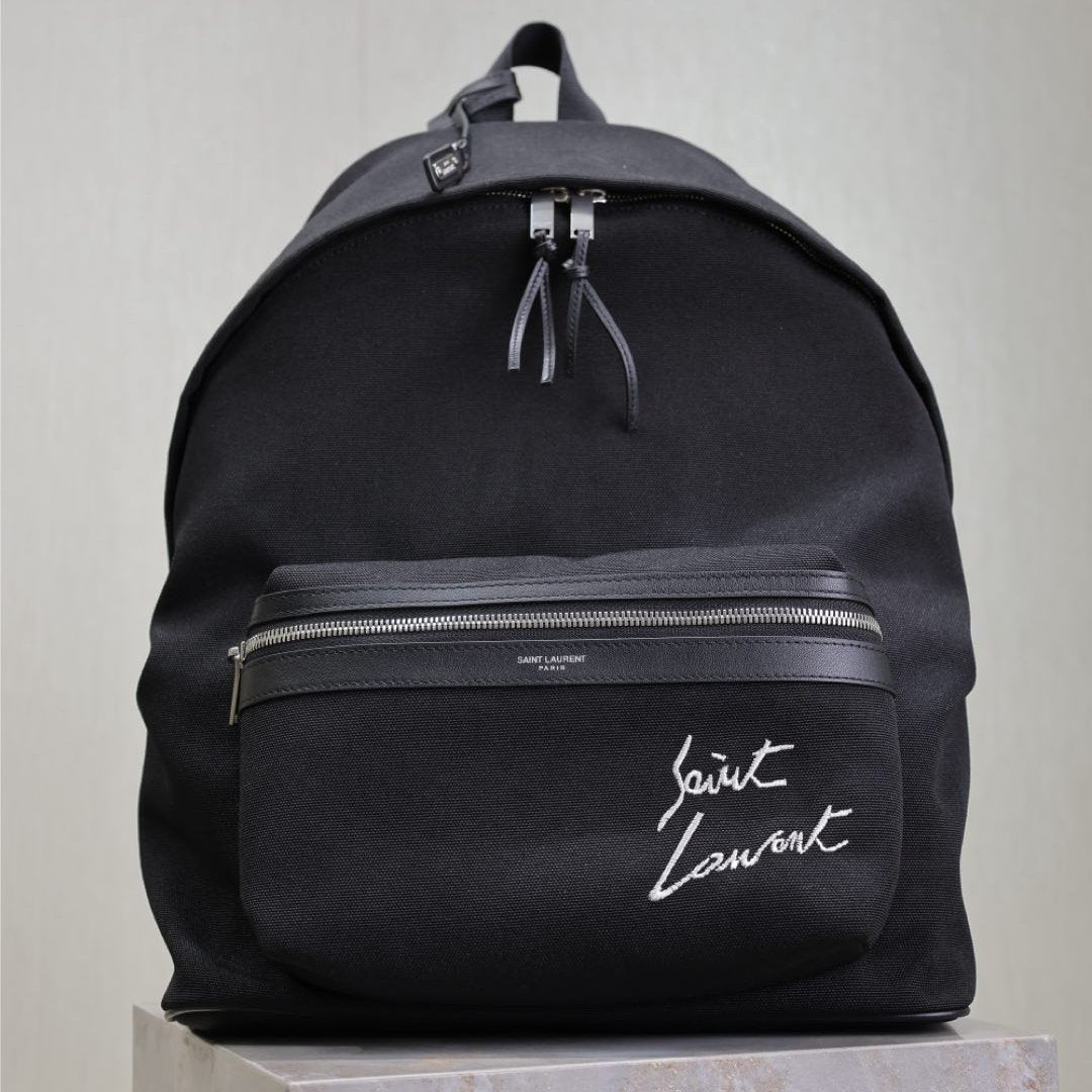 Luxury Saint Laurent CITY BACKPACK 38 IN BLACK CANVAS WITH WHITE EMBROIDED LOGO