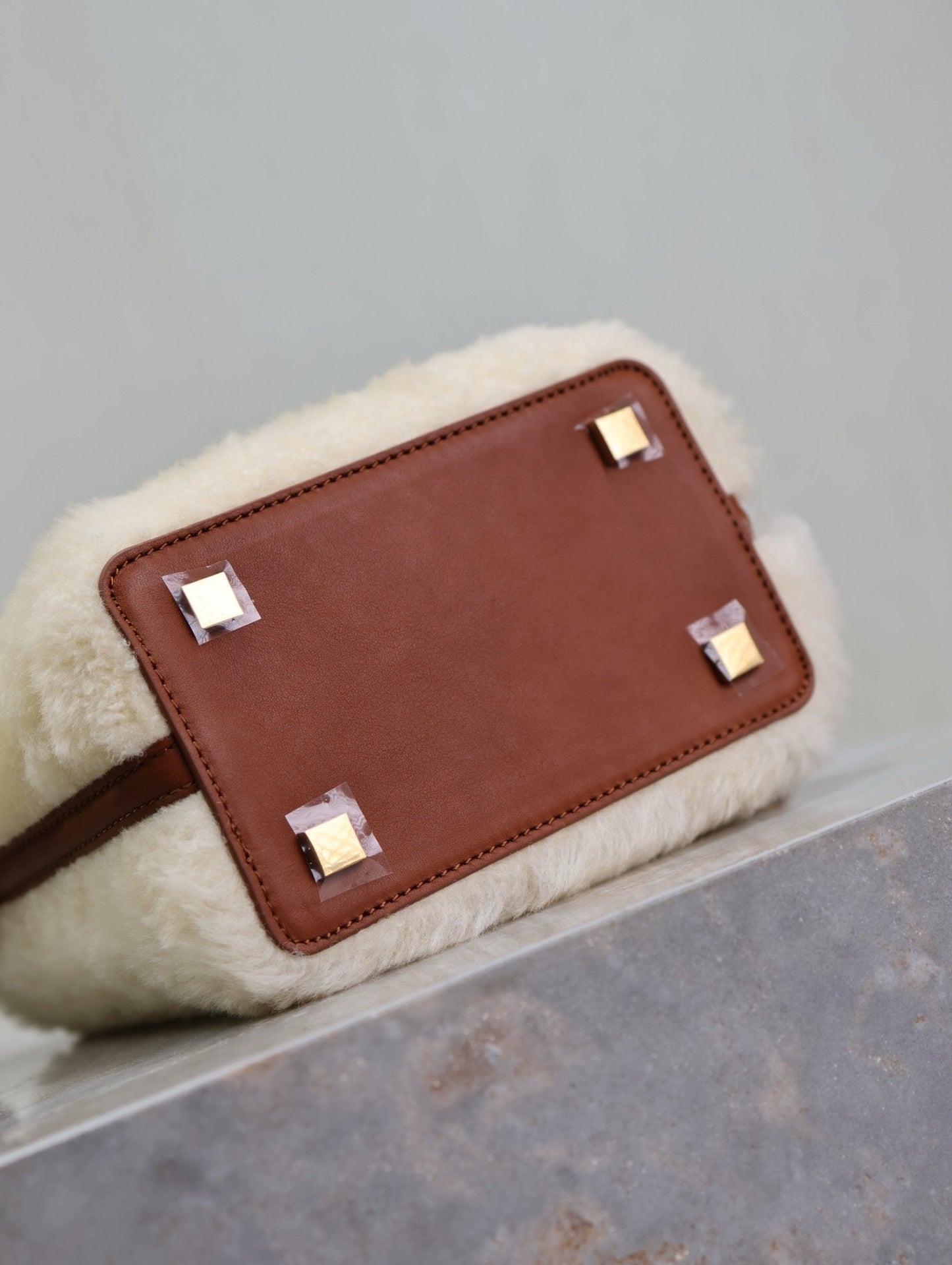 Luxury Saint Laurent LE 37 MINI BUCKET BAG 15 IN CREAM SHEARLING AND BROWN LEATHER TRIM