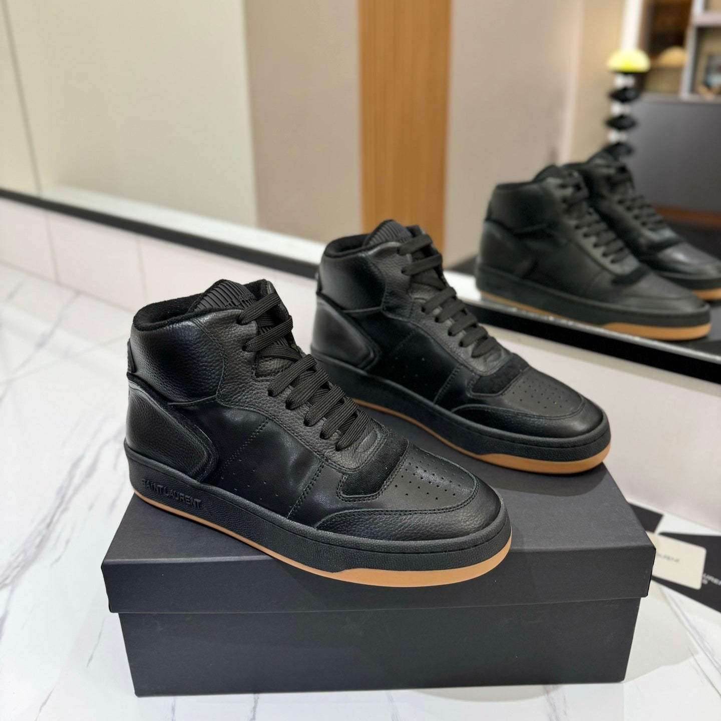 Luxury Saint Laurent MID-TOP SNEAKERS IN BLACK PERFORATED LAMBSKIN