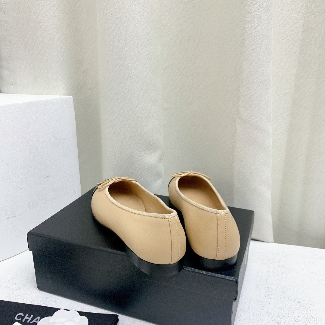 Luxury Chanel ballet flats beige lambskin black patent calfskin